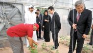 Amal Al Mannai, CEO of Qatar Foundation for Social Activities and Acting Executive Director of Shafallah (third right) with Yasuo Yokota, Managing Director of Mitsubishi (second right) and Seiichi Otsuka Ambassador of Japan (right) at the launch of Green 
