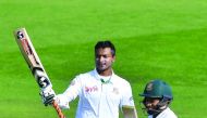 Bangladesh's Shakib Al Hasan (left) celebrates after scoring a double century against New Zealand while with team mate Mushfiqur Rahim looks on during day two of the first Test at the Basin Reserve in Wellington yesterday.