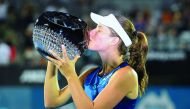 Britain's Johanna Konta kisses the trophy after winning the Women's Singles final at the Sydney International Tennis Tournament in Sydney, Australia, yesterday.