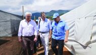 Handout picture released by Colombia's High Commissioner for Peace's press office showing German Foreign Minister Frank-Walter Steinmeier (L) walking next to Colombian High Commissioner for Peace, Sergio Jaramillo (C) and a UN representative, member of th