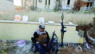 A member of Iraqi Special Operations Forces (ISOF) rests at the University of Mosul during a battle with Islamic State militants, in Mosul, Iraq, yesterday.