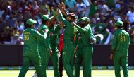 Pakistan bowler Imad Wasim (C) celebrates with teammates after dismissing Australia's batsman Genn Maxwell during their one-day international (ODI) cricket match played at the MCG in Melbourne on 15 January, 2017. (AFP / WILLIAM WEST)
