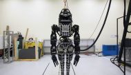 Bipedal humanoid robot, Atlas, primarily developed by Boston Dynamics is presented during a news conference at the University of Hong Kong, October 17, 2013 (REUTERS / Tyrone Siu) 