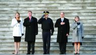 Stand-ins for President-elect Donald Trump, and his wife Melania (left) and Vice-President-elect Mike Pence and his wife Karen (right) take part in a rehearsal for the inauguration on the East Front of the US Capitol in Washington, yesterday.