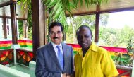 H E Dr Hamad bin Abdulaziz Al Kawari with Grenadian Prime Minister Keith Mitchell.