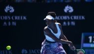 Venus Williams of USA returns the ball to Kateryna Kozlova (not seen) of Ukraine during their women's singles first round match on day one of the Australian Open tennis tournament in Melbourne, Australia on January 16, 2017. Recep ?akar - Anadolu Agency