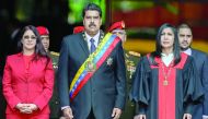 Venezuelan President Nicolas Maduro (centre), his wife Cilia Flores (left) and President of Supreme Court of Justice, Gladys Maria Gutierrez after the ceremony in Caracas.