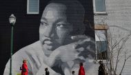 People gather to march in the annual parade down MLK Boulevard to honor Martin Luther King, in Chattanooga, Tennessee, U.S., January 16, 2017. REUTERS/Billy Weeks