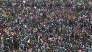 People attend a protest demanding to reverse a Supreme Court ban on the traditional bull-taming contests, known as Jallikattu, at the Marina beach in Chennai, India, January 19, 2017. (REUTERS)