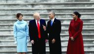 US President Donald Trump and First Lady Melania Trump, with former president Barack Obama and Michelle Obama before their departure from the US Capitol, yesterday.