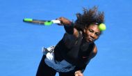 Serena Williams of the US serves against Nicole Gibbs of the US during their women's singles third round match on day six of the Australian Open tennis tournament in Melbourne on January 21, 2017.  AFP / SAEED KHAN