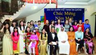 Vietnam Ambassador Nguyen Hoang (fifth right) with community members and guests on the celebration of Vietnamese Lunar New Year at his residence yesterday. Pic: Abdul Basit / The Peninsula 