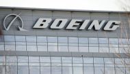 (FILES) This file photo taken on December 13, 2016 shows the logo of aerospace giant Boeing is seen on Boeing's Government Operations office in Arlington, Virginia. Boeing projected January 25, 2017 higher commercial aircraft deliveries in 2017 compared w