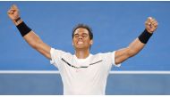 Spain's Rafael Nadal celebrates his win against Canada's Milos Raonic at the Australian Open quarter-final in Melbourne yesterday. 