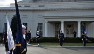 Members of the US military await the arrival of British Prime Minister Theresa May before a meeting with US President Donald Trump at the White House on January 27, 2017 in Washington, DC. / AFP / Brendan Smialowski