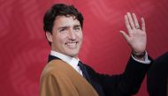 (FILES) This file photo taken on November 20, 2016 shows Canada's Prime Minister Justin Trudeau waving during the traditional 