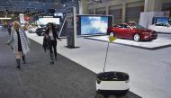 A January 26, 2016 photo shows the Starship Technologies delivery robot at the Washington Auto Show in Washington, DC. AFP / MANDEL NGAN 