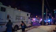 Canadian police officers respond to a shooting in a mosque at the Quebec City Islamic cultural center on Sainte-Foy Street in Quebec city on January 29, 2017. AFP / Alice Chiche
