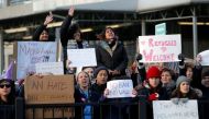 People gather outside Terminal 4 during a protest against Donald Trump's travel ban at John F. Kennedy International Airport in Queens, New York, U.S., January 29, 2017. REUTERS/Andrew Kelly
