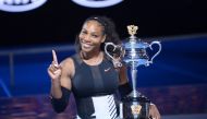 Serena Williams of United States poses with the championship trophy after winning the Australian Open women's singles final match against his sister Venus Williams at Rod Laver Arena in Melbourne, Australia on January 28, 2017. ( Recep ?akar - Anadolu Age