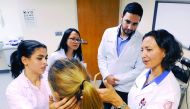 Dr Stella Major (right) teaching WCM-Q students essential physicianship skills in the college’s state-of-the-art Clinical Skills Center. 