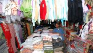 An undated file photo of a shopkeeper at Thursday Friday Souq. 