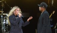 (FILES) This November 4, 2016 file photo shows Beyonce and and Jay Z perform on stage during a Get Out The Vote concert in support of Hillary Clinton at Wolstein Center in Cleveland, Ohio. AFP / Getty Images North America / Duane Prokop 
