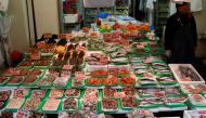 A seller waits for customers at a seafood shop in Tokyo, Japan, January 23, 2017. REUTERS/Kim Kyung-Hoon