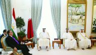 Emir H H Sheikh Tamim bin Hamad Al Thani with the President of Republic of Tajikistan, Emomali Rahmon, at Emiri Diwan yesterday. 

