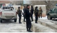 Afghan policemen keep watch at the site of a bomb blast in Kabul, Afghanistan February 7, 2017. REUTERS/Omar sobhani
