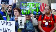 People protest against US President Donald Trump's directive to permit the Dakota Access Pipeline during a demonstration at the White House in Washington, yesterday.