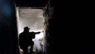 REPRESENTATIVE IMAGE: A fighter of Libyan forces allied with the UN backed government aims his weapon against Islamic State militants in Ghiza, Bahriya district in Sirte, Libya, Nov 9, 2016 (REUTERS) 