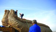 The 'Viracocha III', a boat made only from reeds, is pictured after arriving to a beach on the Pacific shores in the northern Chile as part its preparation to cross to Australia on an expected six-month journey, in Arica, Chile February 9, 2017. Picture t