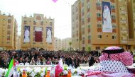 A ceremony being held for handing over flats of the second phase of the residential units of HH Sheikh Hamad bin Khalifa Al Thani City at Khan Younis in Southern Gaza Strip yesterday.