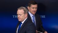 This file photo taken on February 01, 2017 shows US National Security Adviser Mike Flynn (R) walking past Press Secretary Sean Spicer as he makes his way to the lectern during the daily press briefing at the White House in Washington, DC. (AFP / NICHOLAS 