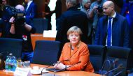 German Chancellor Angela Merkel sits in the witness stand of a parliamentary inquiry in Berlin investigating the NSA's activities in Germany, yesterday.