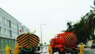 Rain water being pumped out from an inundated street yesterday. 