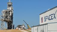 Space X's Falcon 9 rocket is prepared for a launch to the International Space Station February 17, 2017 at the Kennedy Space Center, Florida on LC39A, one of the renovated Space Shuttle launch pads that SpaceX leases from NASA.  AFP / BRUCE WEAVER
