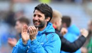 Lincoln City's English manager Danny Cowley reacts after winning the English FA Cup fifth round football match between Lincoln City and Burnley at Turf moor stadium in Burnley, northwest England, on February 18, 2017. (AFP / Anthony Devlin)