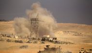Smoke rises next to a position held by the Iraqi rapid response forces during a battle against Islamic State militants in the south of Mosul, Iraq February 19, 2017. REUTERS/Zohra Bensemra TPX IMAGES OF THE DAY
