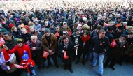People attend a rally to support opposition TV channel Rustavi 2 in Tbilisi, yesterday.