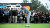 February 19, 2017; Pacific Palisades, CA, USA; Dustin Johnson putts on the eighteenth hole green during the final round of the Genesis Open golf tournament at Riviera Country Club. Gary A. Vasquez-USA TODAY Sports