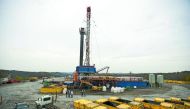 A rig drilling natural gas at a hydraulic fracturing site located atop the Marcellus shale rock formation in Washington Township, USA.