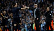  Manchester City manager Pep Guardiola with referee Antonio Mateu Lahoz Reuters / Phil Noble
