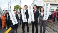 Lawyers of plaintiffs' side react after receiving a judgment that dismissed the request for the suspension of US military flights in Okinawa on February 23, 2017. AFP / JIJI PRESS / STR
