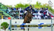 Ramzy Hamad Al Duhami guides Garlic VH Kapelhof  over an obstacle during the CSI5* 150cm event of the H H The Emir’s Sword International Showjumping Championship at Qatar Equestrian Federation’s outdoor arena yesterday. Picture: Lotfi Garsi
