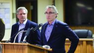 North Dakota Governor Doug Burgum (right) addresses a press conference announcing plans for clean up of Oceti Sakowin protest camp in Mandan, yesterday.