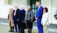 United Nations mediator for Syria Staffan de Mistura and a group of women whose family members have either been detained by Syrian authorities or abducted by armed groups, hold a minute of silence, outside the United Nations office in Geneva during the Ge