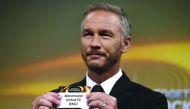 Sweden's former defender and 2017 Europa League final ambassador Patrik Andersson shows the name of Manchester United during the draw for the round of 16 of the UEFA Europa League tournament in Nyon, yesterday.