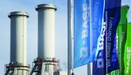 Flags with the logo of German chemicals company BASF flutter in front of the headquarters in Ludwigshafen, Germany.